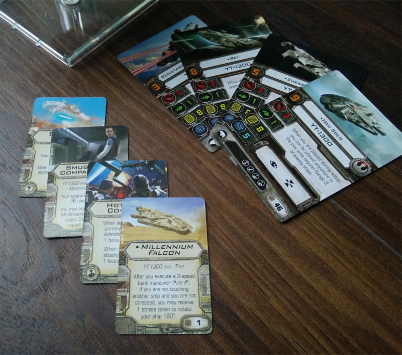 Some of the pilots and extra abilities you can equip the Millennium Falcon with. Han Solo costs a lot of points, obviously.